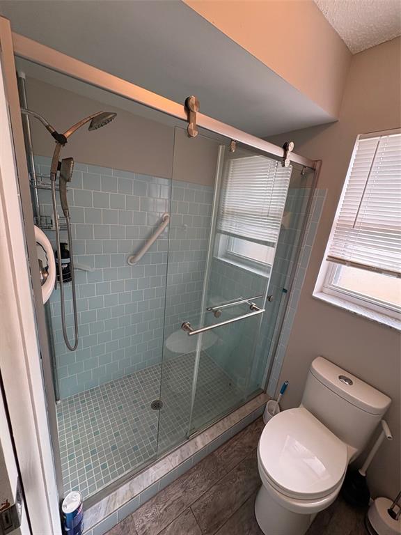 947 Shasta Road Venice, FL 34293 - Photo 48 of 52 a bathroom with a toilet and a shower