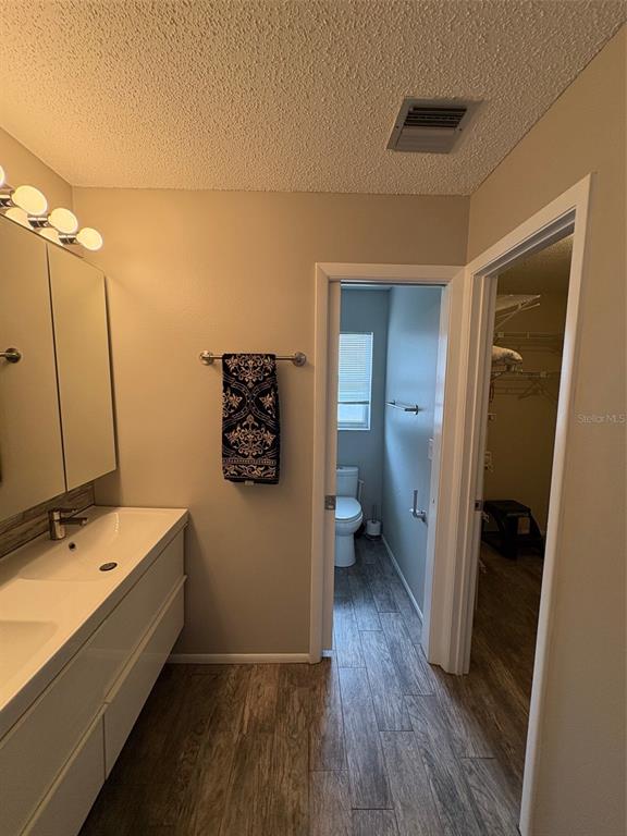 947 Shasta Road Venice, FL 34293 - Photo 49 of 52 a bathroom with a sink and a mirror