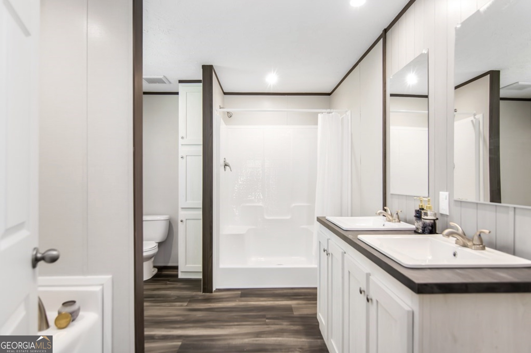 152 Wendy Hill Road Ellijay, GA 30536 - Photo 22 of 41 a bathroom with a sink and a mirror with toilet