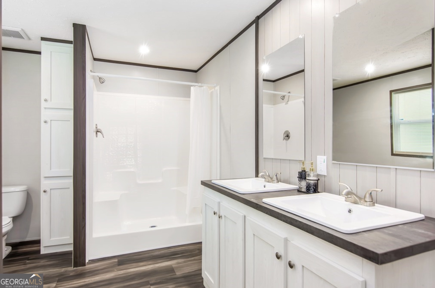 152 Wendy Hill Road Ellijay, GA 30536 - Photo 26 of 41 a bathroom with a sink and a mirror