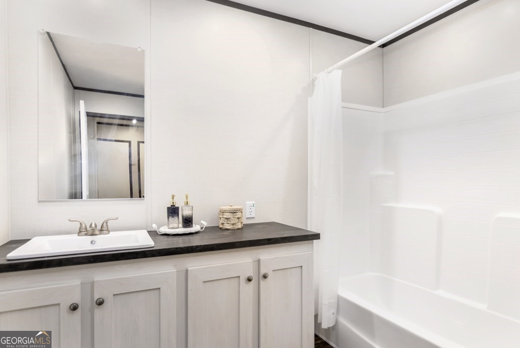 152 Wendy Hill Road Ellijay, GA 30536 - Photo 31 of 41 a bathroom with a sink and a mirror