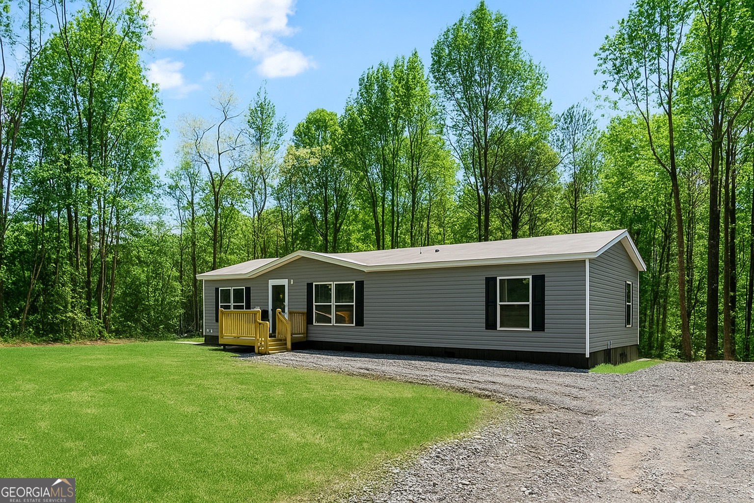 152 Wendy Hill Road Ellijay, GA 30536 - Photo 40 of 41 a view of a house with backyard and garden