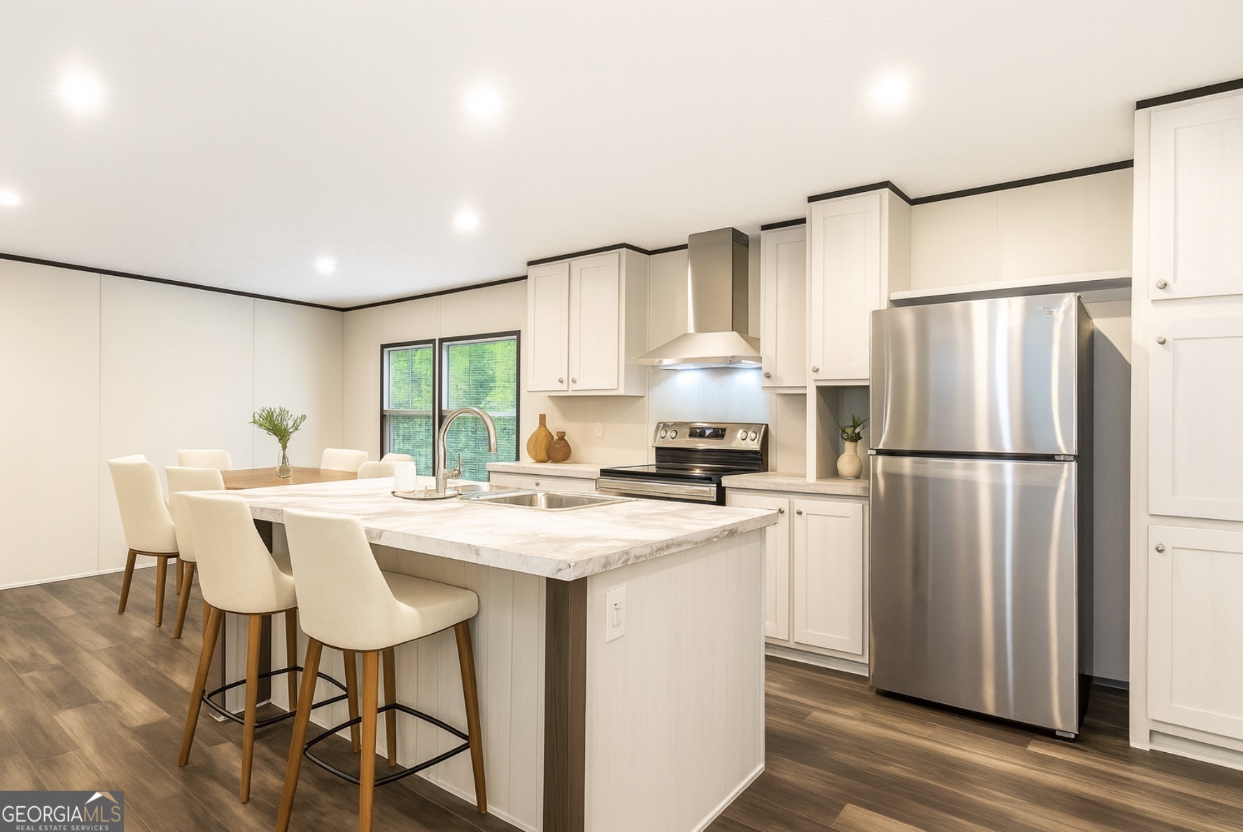 152 Wendy Hill Road Ellijay, GA 30536 - Photo 5 of 41 a kitchen with stainless steel appliances a refrigerator a sink a stove a table and chairs