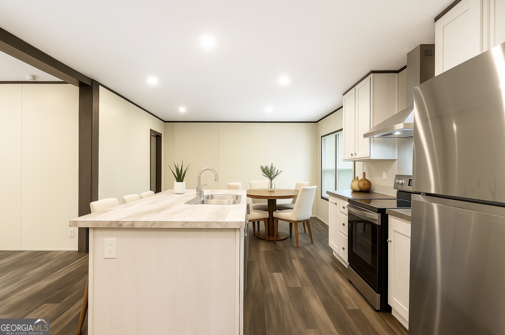 152 Wendy Hill Road Ellijay, GA 30536 - Photo 10 of 41 a kitchen with stainless steel appliances granite countertop a refrigerator a stove a sink dishwasher and a refrigerator with wooden floor
