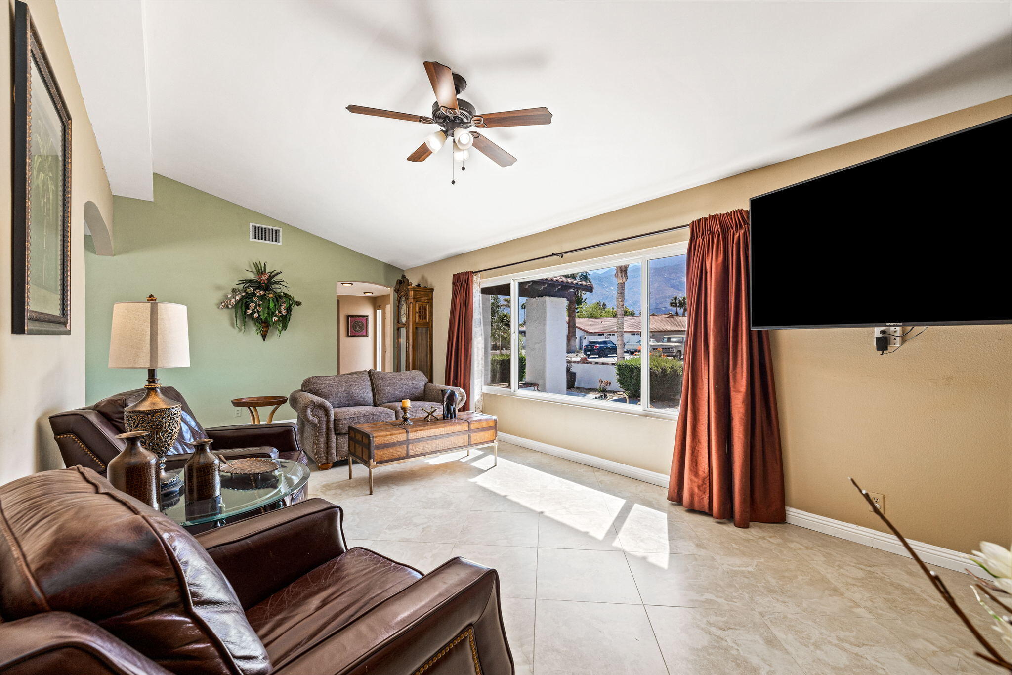 2290 North Victoria Road Palm Springs, CA 92262 - Photo 13 of 42 a living room with furniture and a flat screen tv