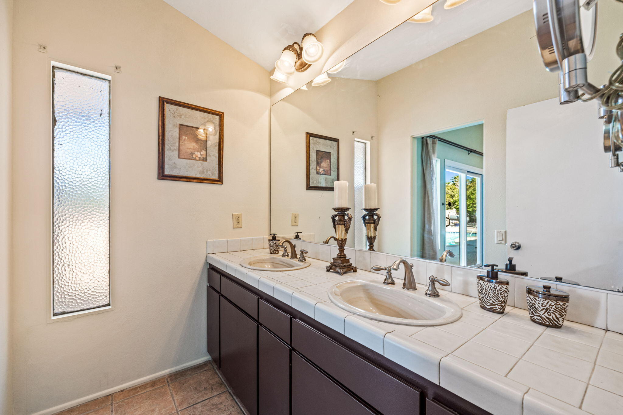 2290 North Victoria Road Palm Springs, CA 92262 - Photo 27 of 42 a bathroom with a sink double vanity and a mirror