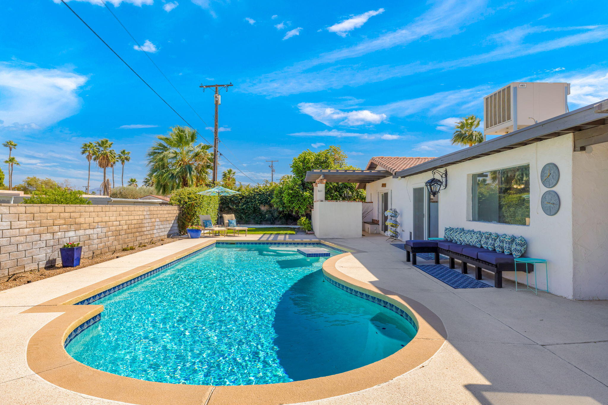 2290 North Victoria Road Palm Springs, CA 92262 - Photo 29 of 42 a swimming pool with outdoor seating