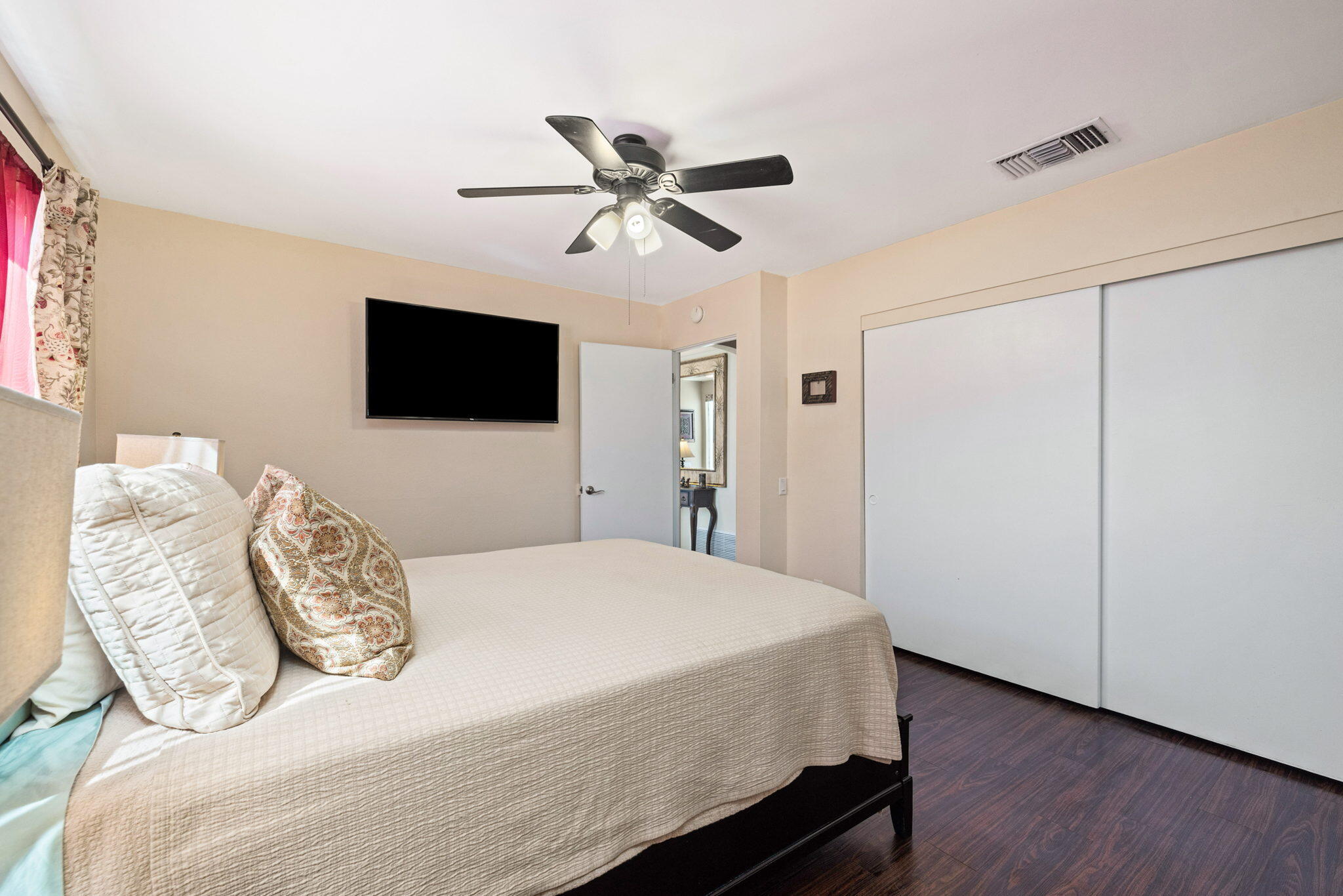 2290 North Victoria Road Palm Springs, CA 92262 - Photo 33 of 42 a bedroom with a bed and a flat screen tv