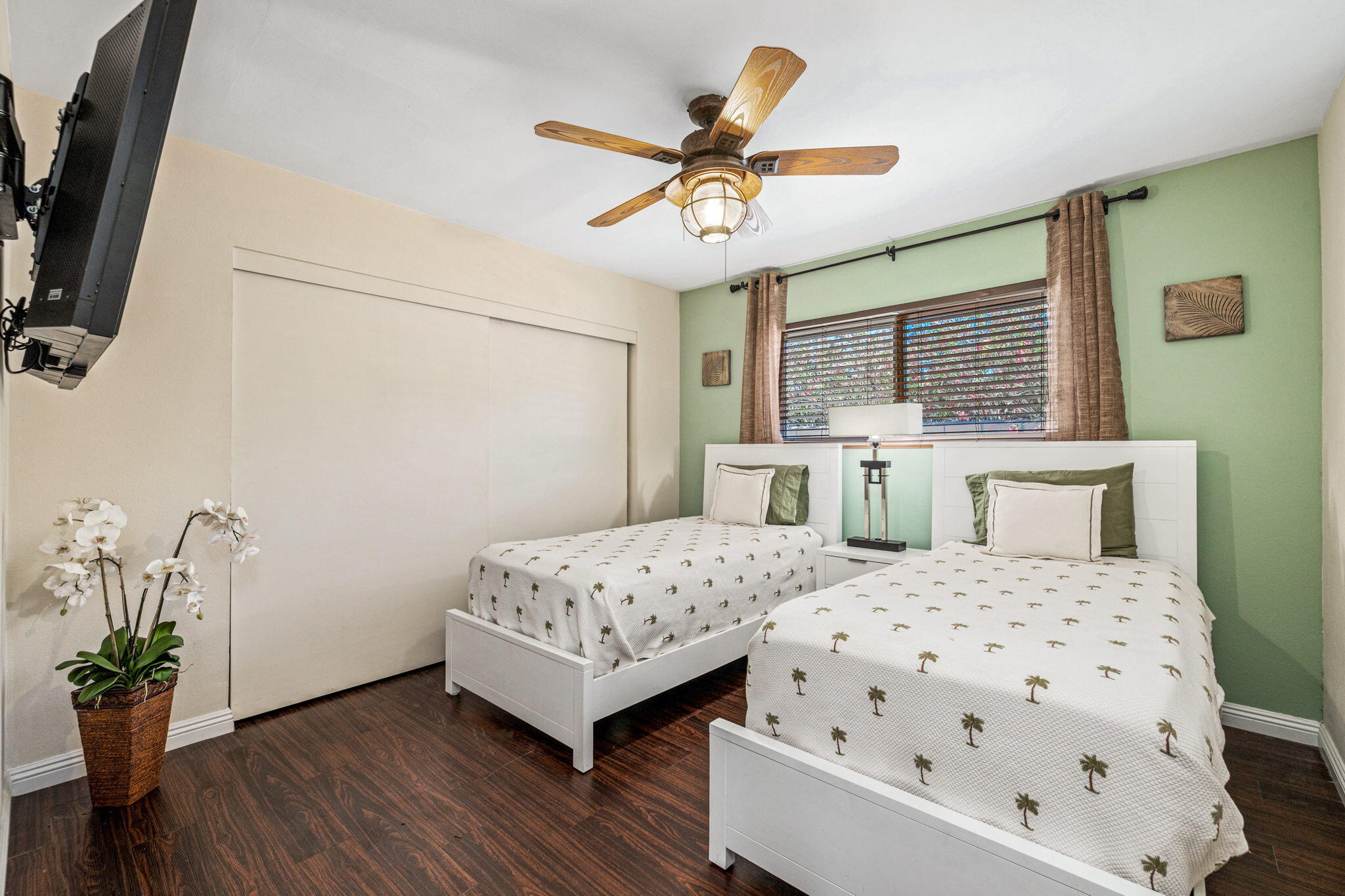 2290 North Victoria Road Palm Springs, CA 92262 - Photo 36 of 42 a bedroom with a bed and a chandelier