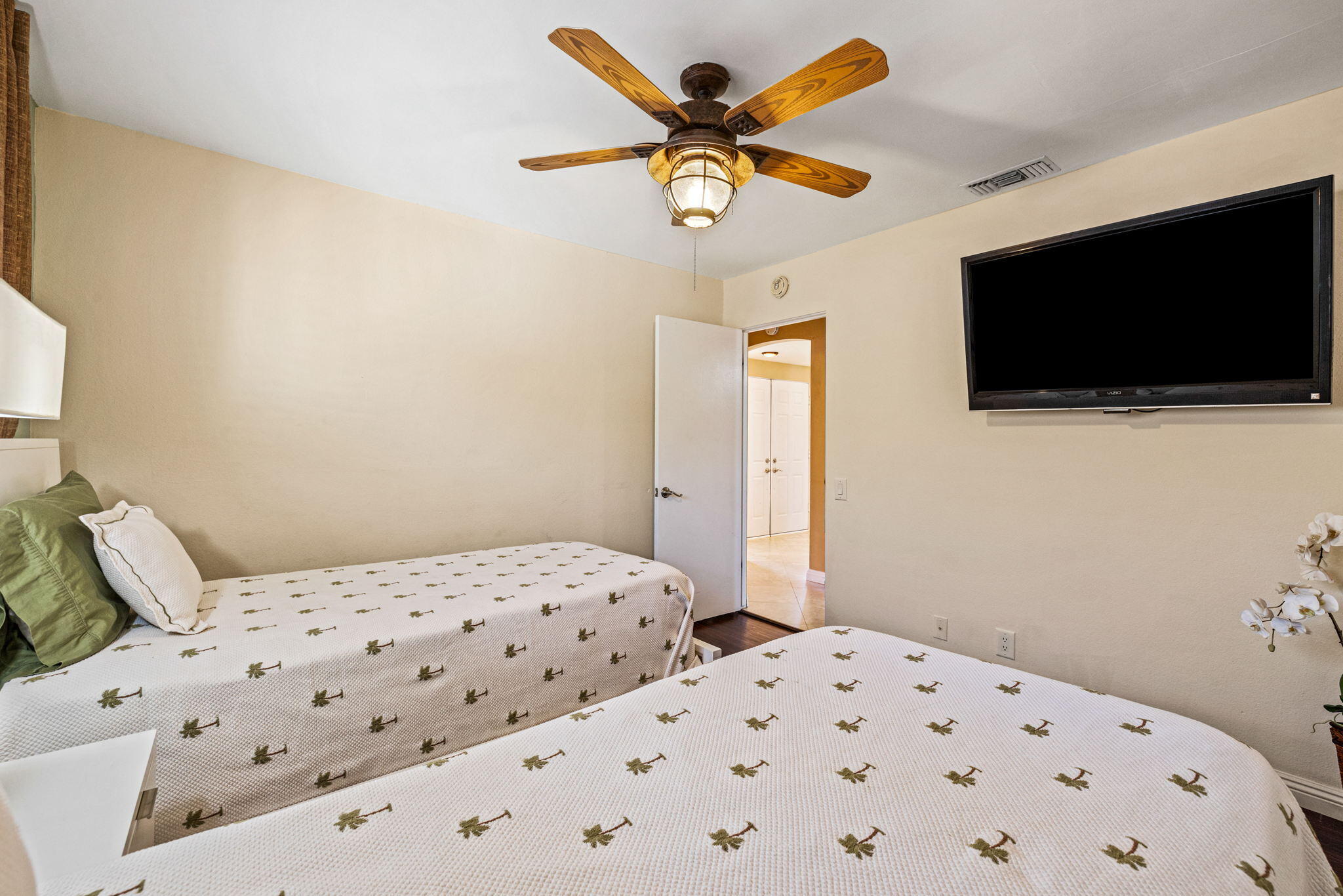 2290 North Victoria Road Palm Springs, CA 92262 - Photo 37 of 42 a bedroom with a bed and flat screen tv