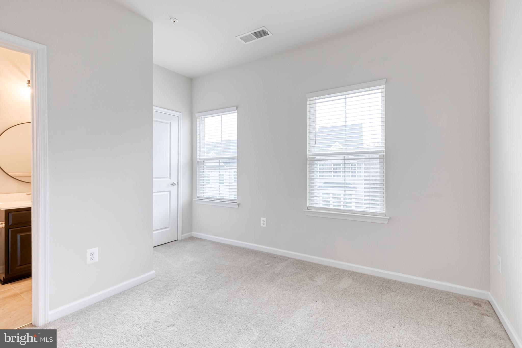 1438 Strahorn Road Hanover, MD 21076 - Photo 14 of 19 an empty room with a window