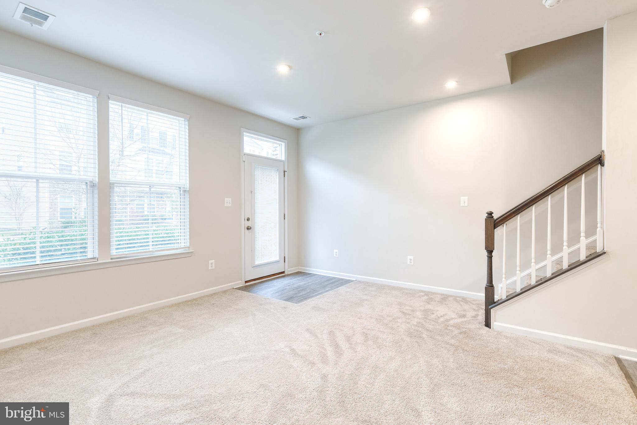 1438 Strahorn Road Hanover, MD 21076 - Photo 17 of 19 a view of an empty room with a window