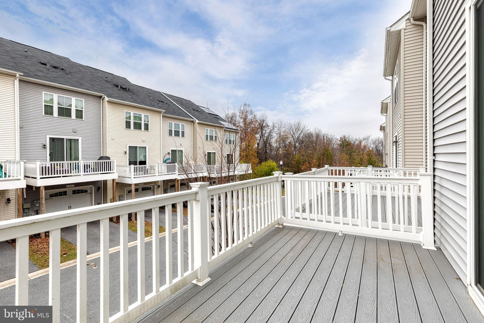 1438 Strahorn Road Hanover, MD 21076 - Photo 18 of 19 a view of a house with wooden deck