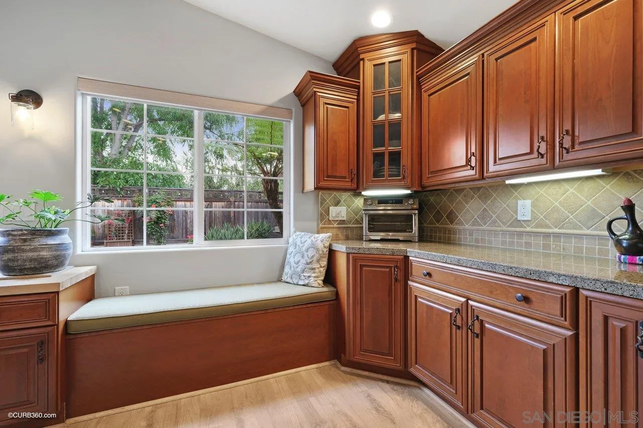 9541 Mandeville Road Santee, CA 92071 - Photo 12 of 32 a kitchen with stainless steel appliances granite countertop a sink and a cabinets