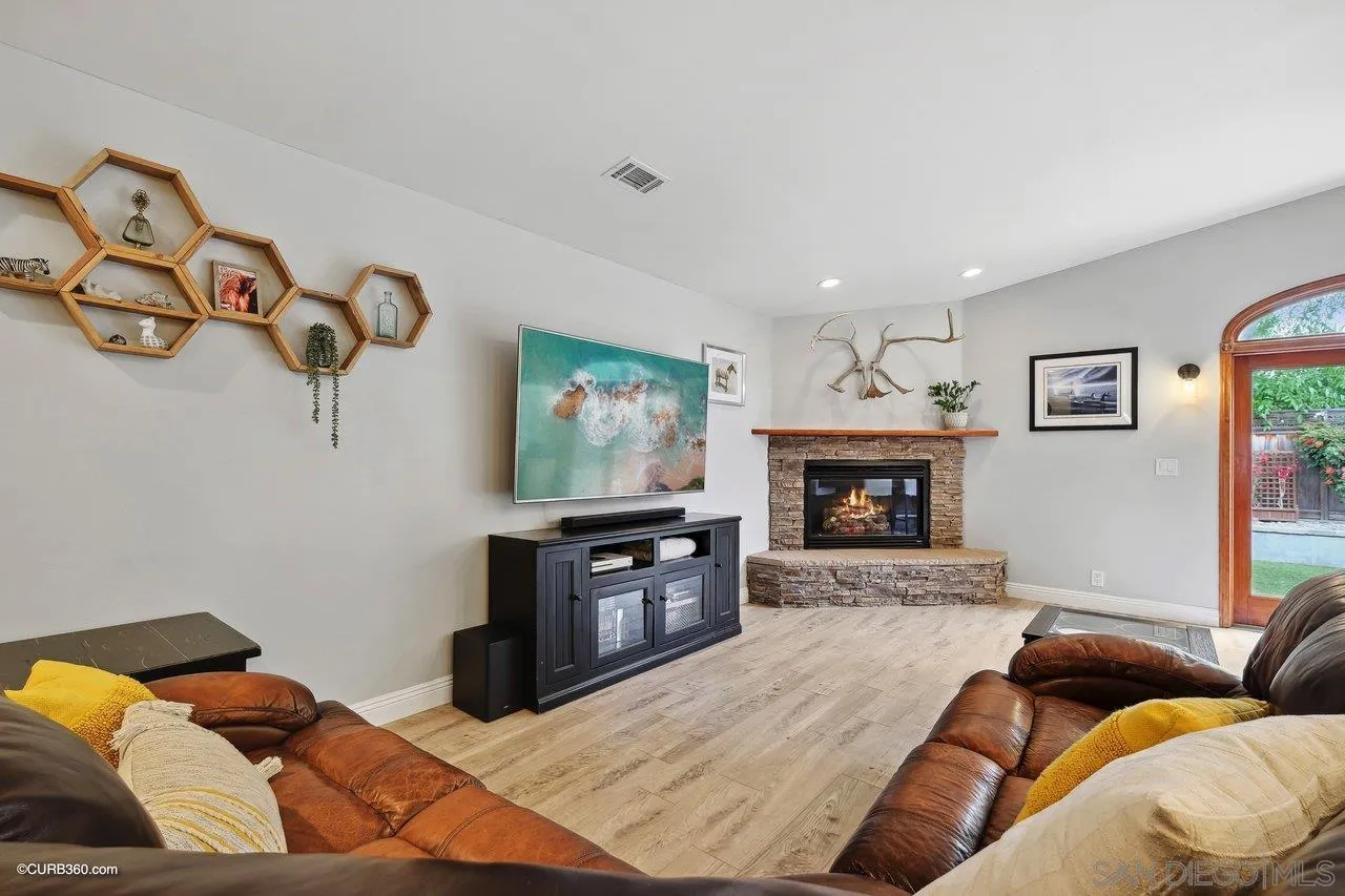 9541 Mandeville Road Santee, CA 92071 - Photo 15 of 32 a living room with furniture and a flat screen tv