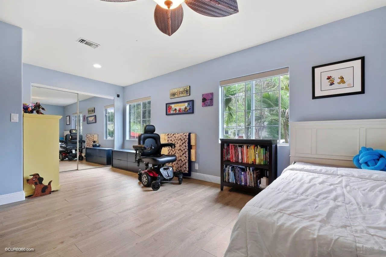 9541 Mandeville Road Santee, CA 92071 - Photo 18 of 32 a bed room with furniture and a window