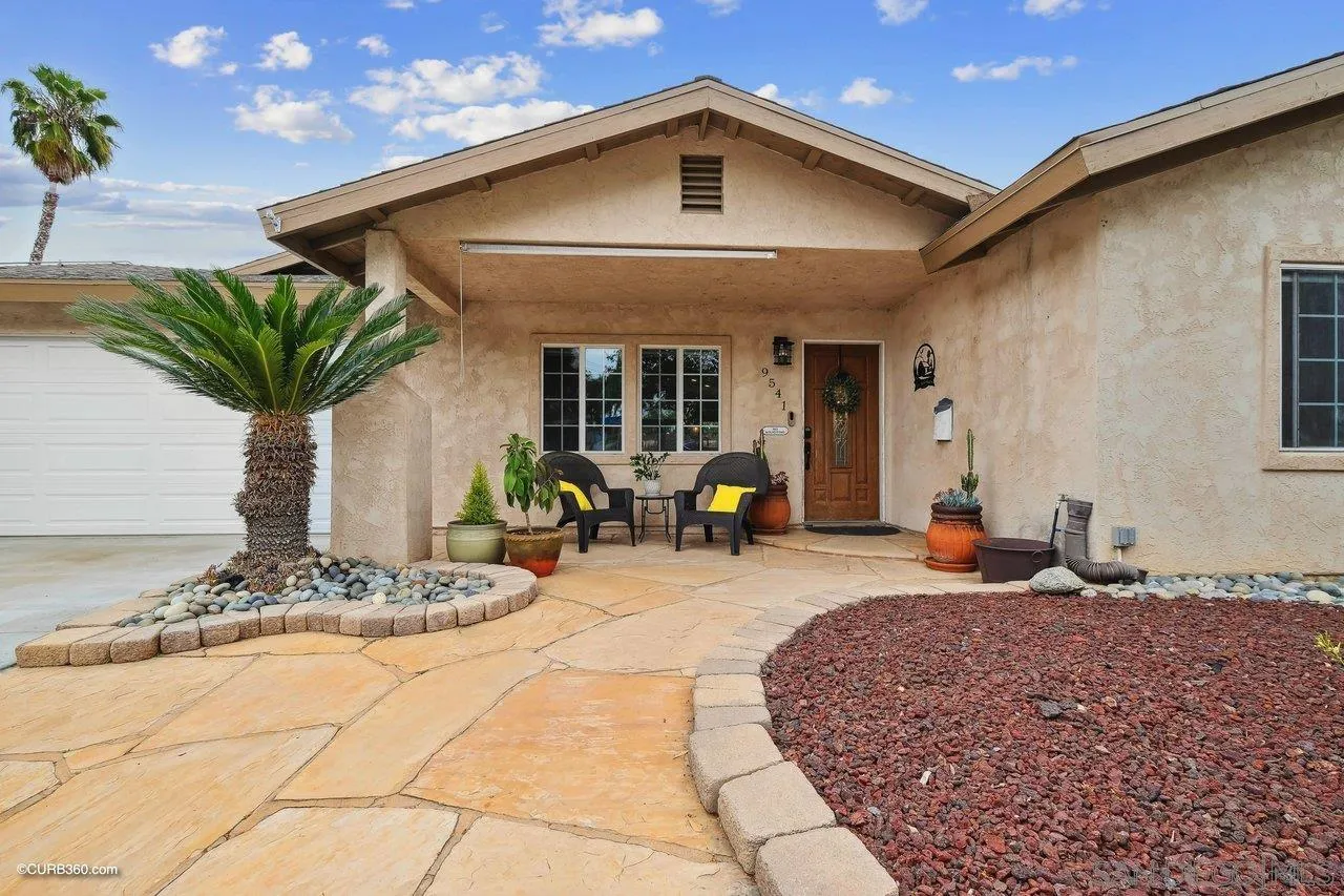 9541 Mandeville Road Santee, CA 92071 - Photo 2 of 32 a front view of a house with patio