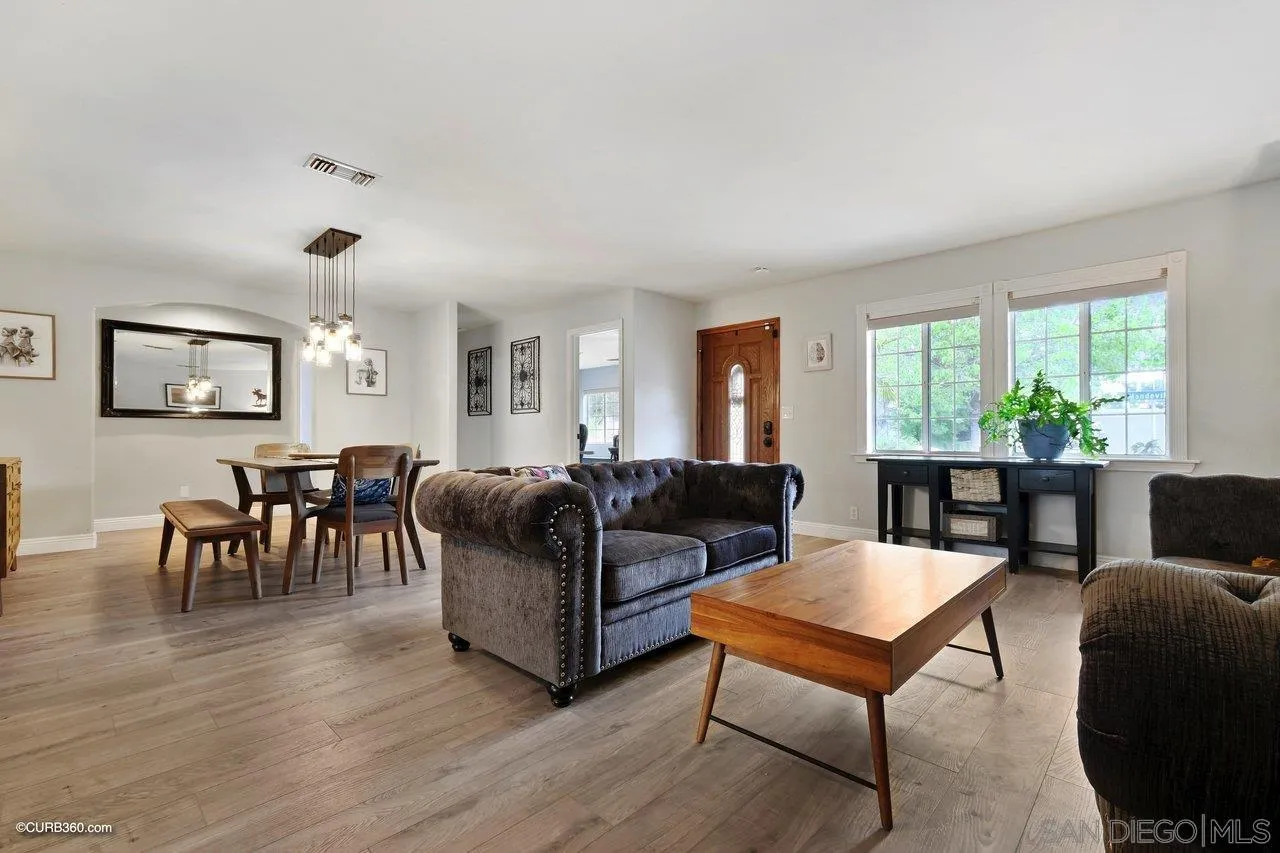 9541 Mandeville Road Santee, CA 92071 - Photo 3 of 32 a living room with furniture and a wooden floor