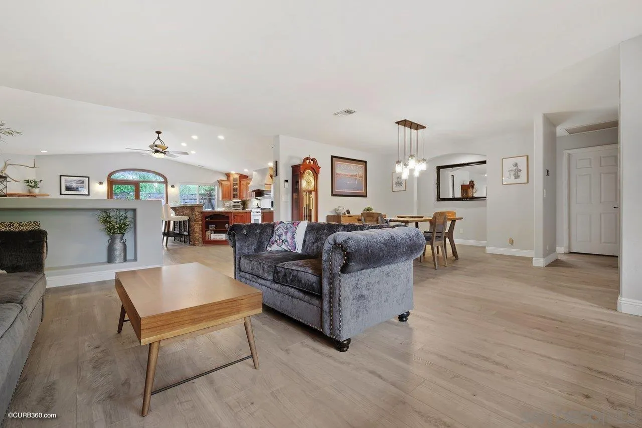 9541 Mandeville Road Santee, CA 92071 - Photo 5 of 32 a living room with furniture and a wooden floor