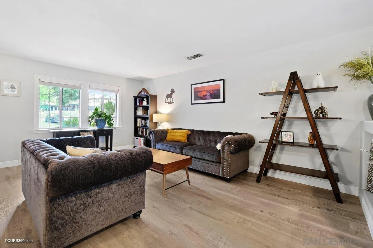 9541 Mandeville Road Santee, CA 92071 - Photo 6 of 32 a living room with furniture and a window
