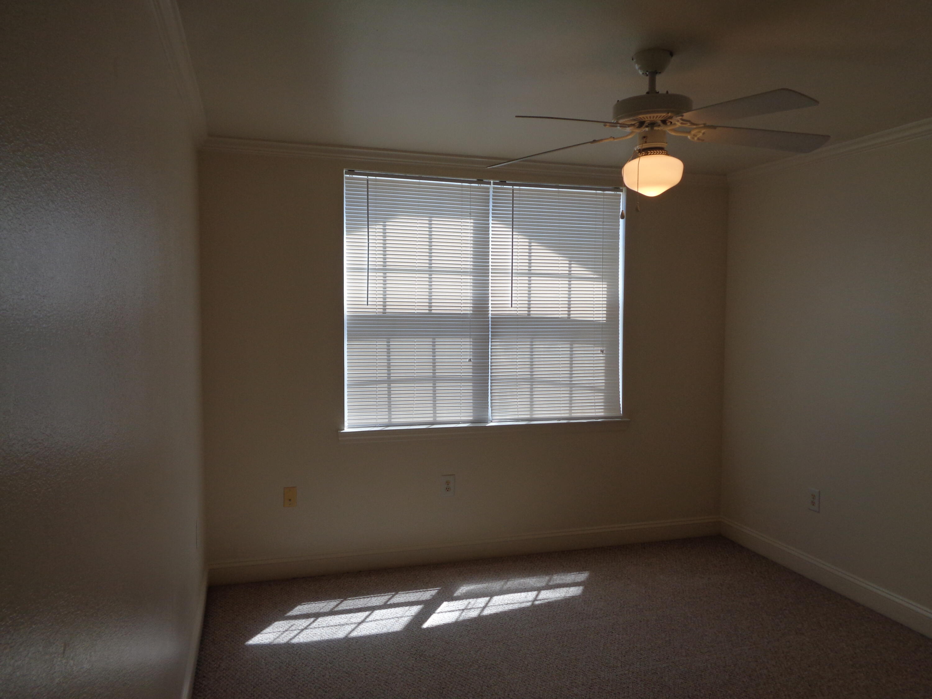 555 Wingspan Way Crestview, FL 32536 - Photo 13 of 24 an empty room with a window