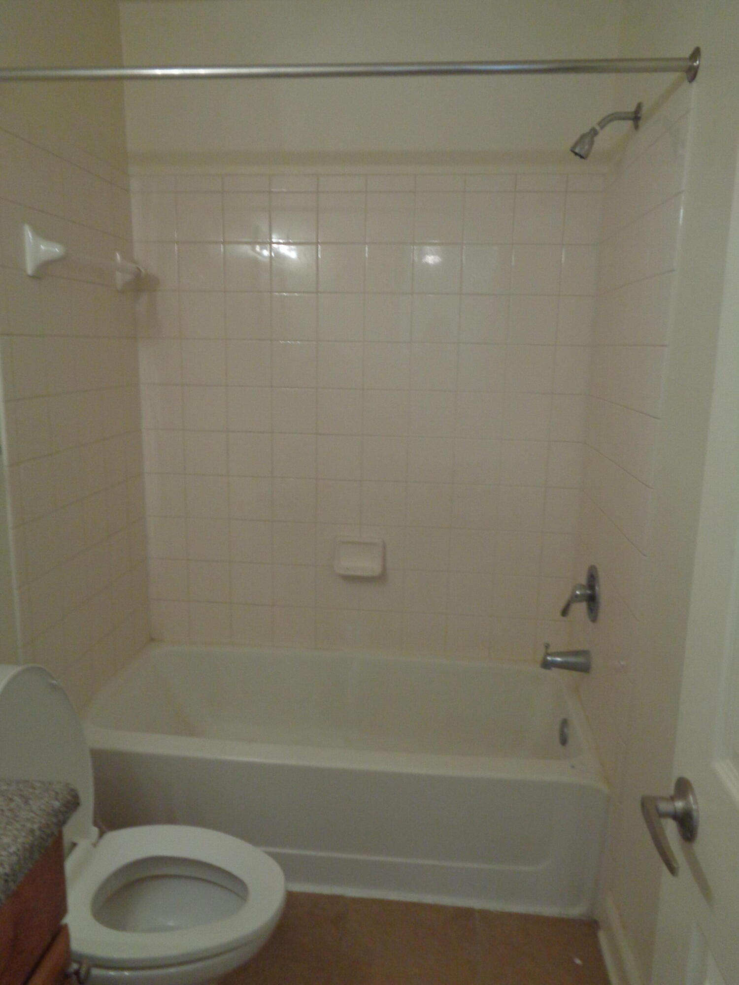 555 Wingspan Way Crestview, FL 32536 - Photo 23 of 24 a bathroom with a shower and a toilet