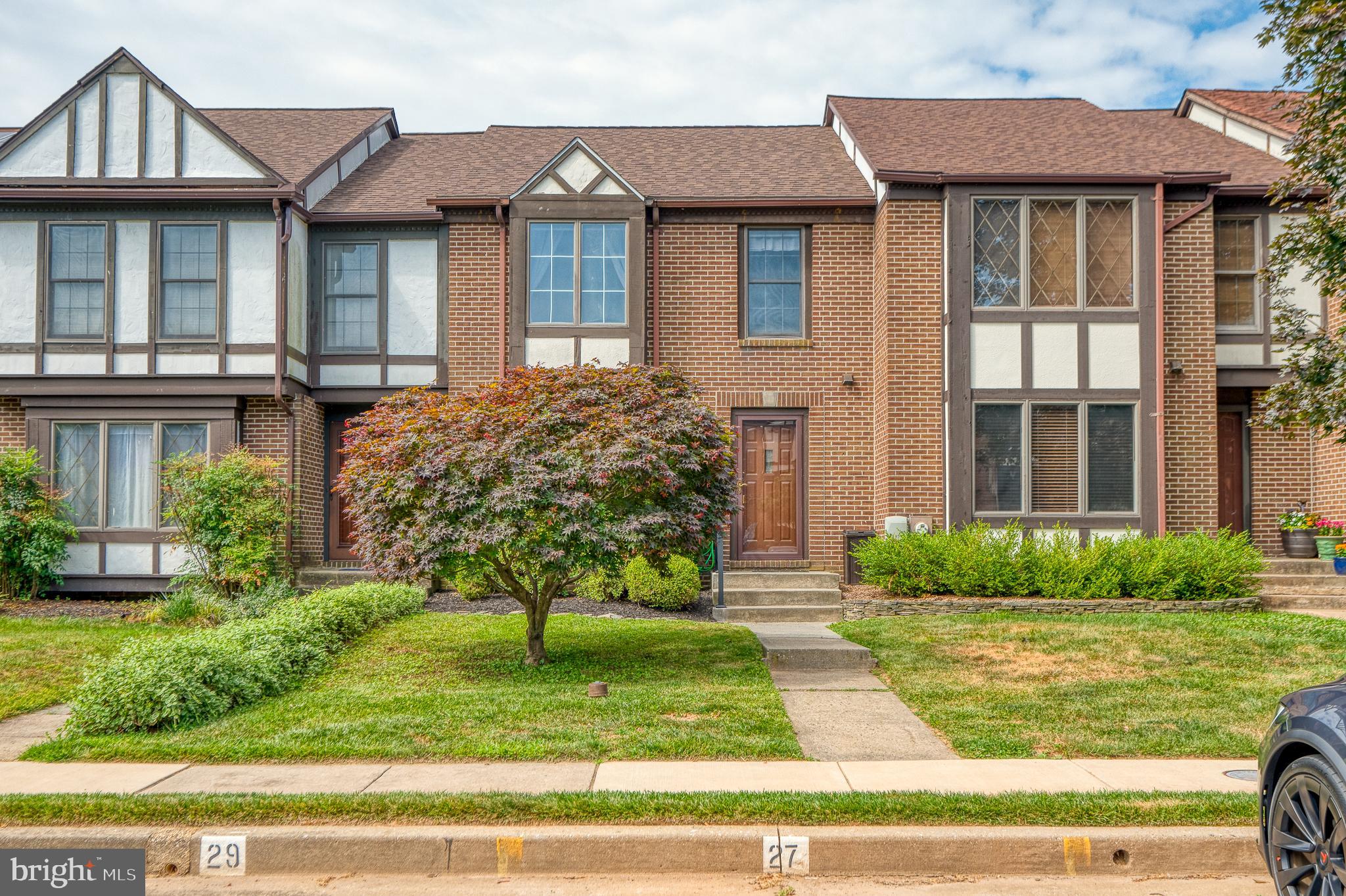 27 Faraday Drive Lutherville-Timonium, MD 21093 - Photo 2 of 60 a front view of a house with garden
