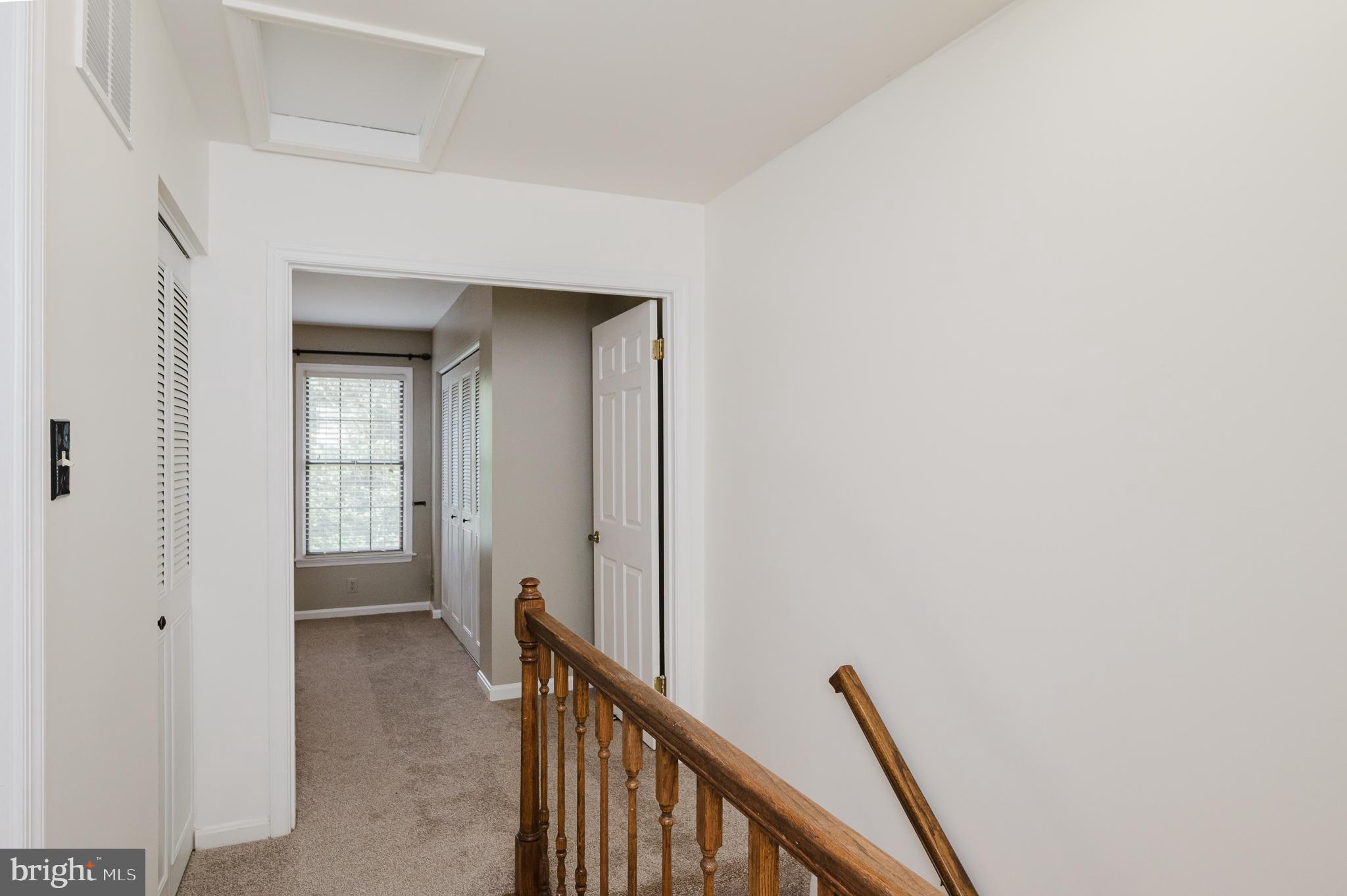 27 Faraday Drive Lutherville-Timonium, MD 21093 - Photo 23 of 60 a view of a hallway with wooden floor