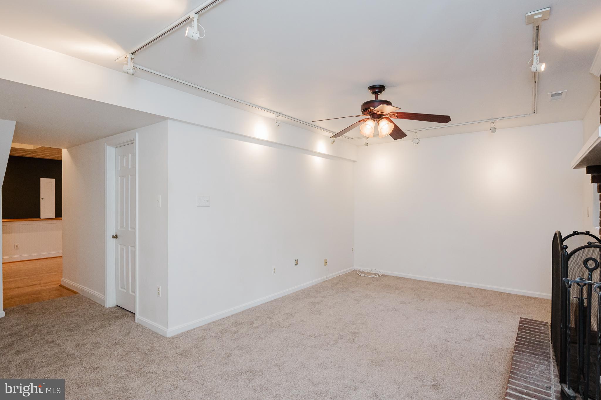 27 Faraday Drive Lutherville-Timonium, MD 21093 - Photo 46 of 60 an empty room with ceiling fan and window