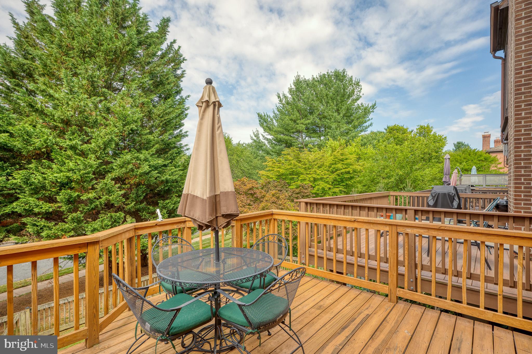 27 Faraday Drive Lutherville-Timonium, MD 21093 - Photo 50 of 60 a view of a chair and tables on the roof deck