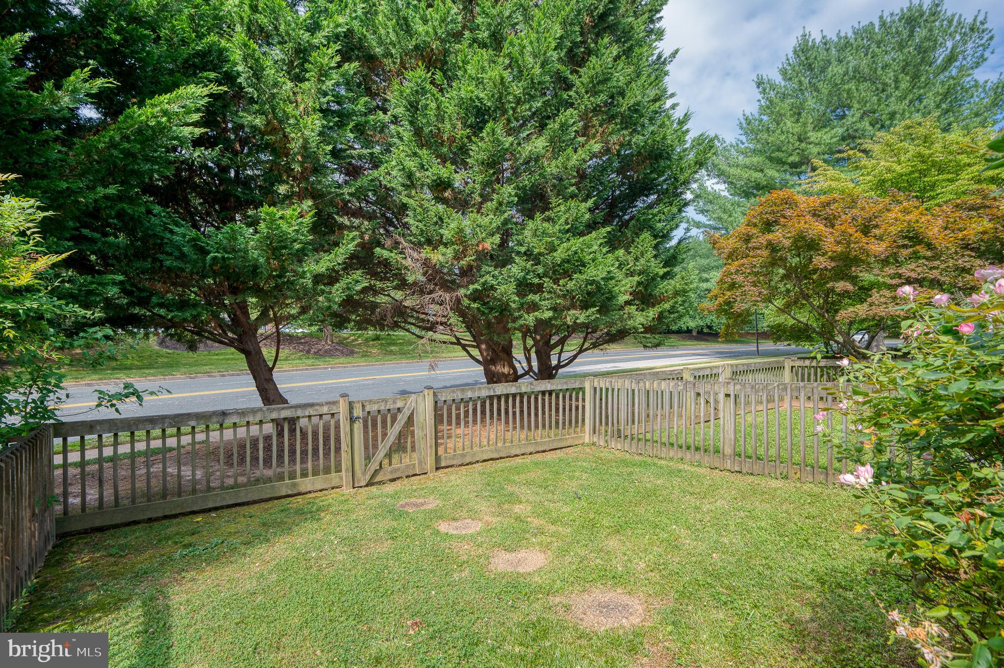27 Faraday Drive Lutherville-Timonium, MD 21093 - Photo 56 of 60 a view of a house with a small yard and a large tree