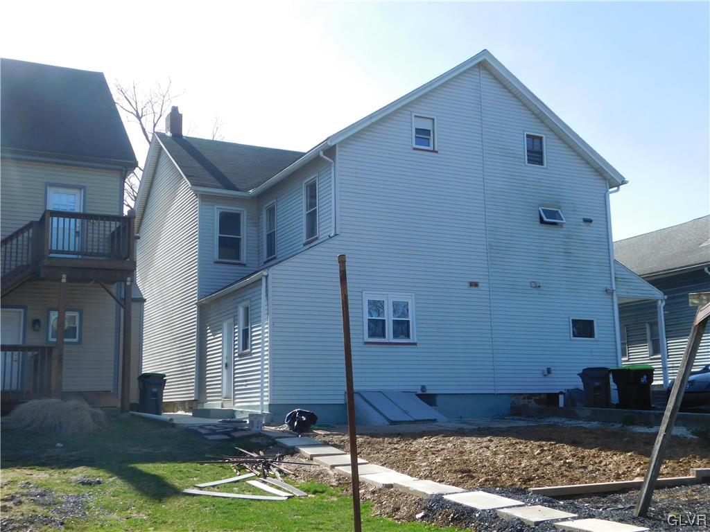 121 Main Street Stockertown, PA 18083 - Photo 3 of 28 a front view of a house with garden