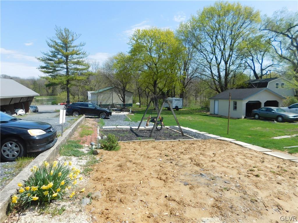 121 Main Street Stockertown, PA 18083 - Photo 4 of 28 a view of a swimming pool with a patio