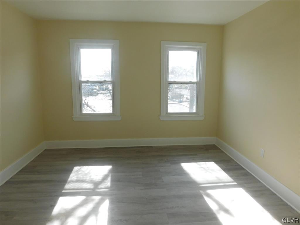 121 Main Street Stockertown, PA 18083 - Photo 9 of 28 a view of empty room with windows