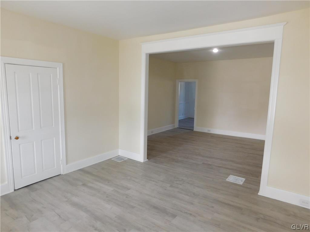 121 Main Street Stockertown, PA 18083 - Photo 10 of 28 a view of an empty room with wooden floor and closet