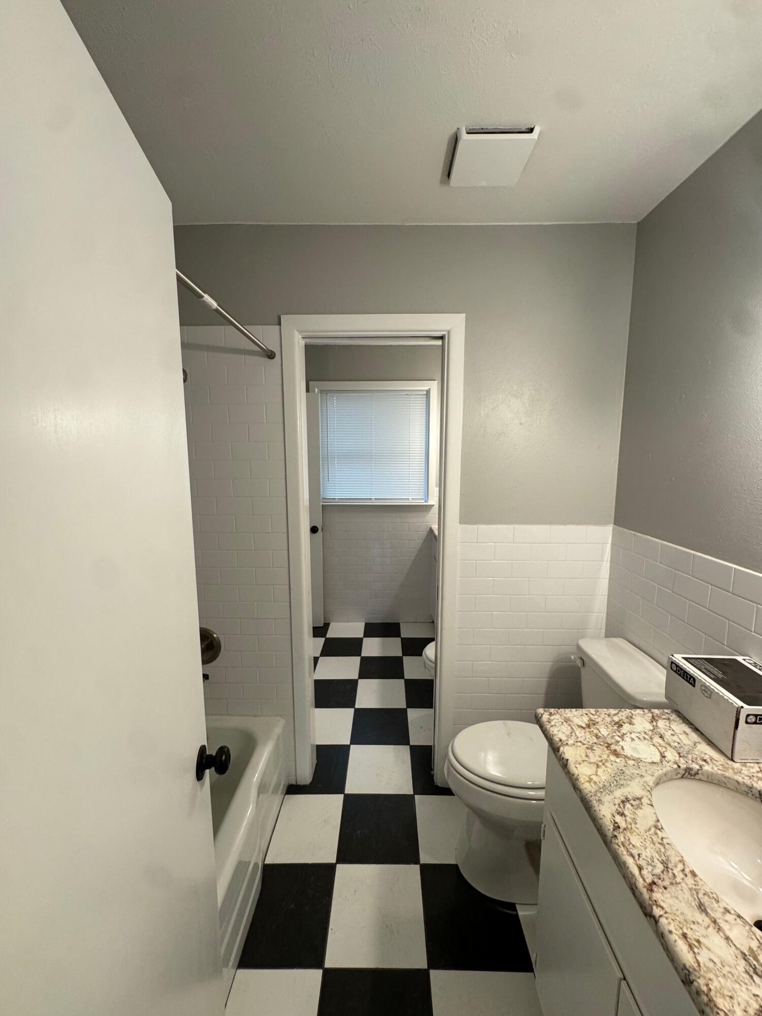 4409 38th Street Lubbock, TX 79414 - Photo 13 of 21 Jack-N-Jill Bathroom