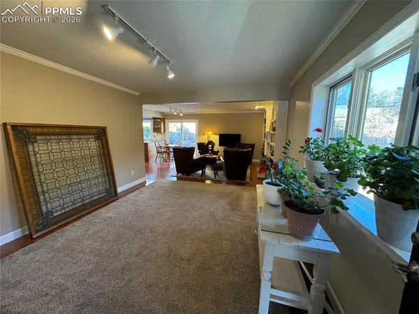 a spacious bathroom with a double vanity sink a mirror and a bathtub