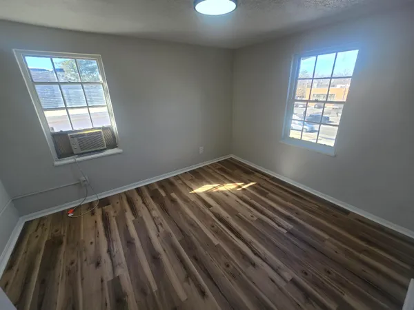 a view of an empty room and window