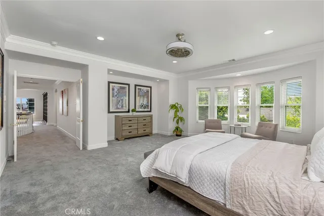 a utility room with a sink a stove and cabinets