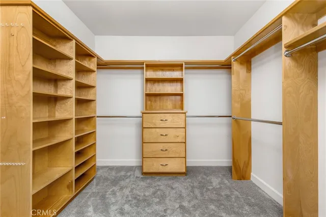 a view of a backyard with a small cabin