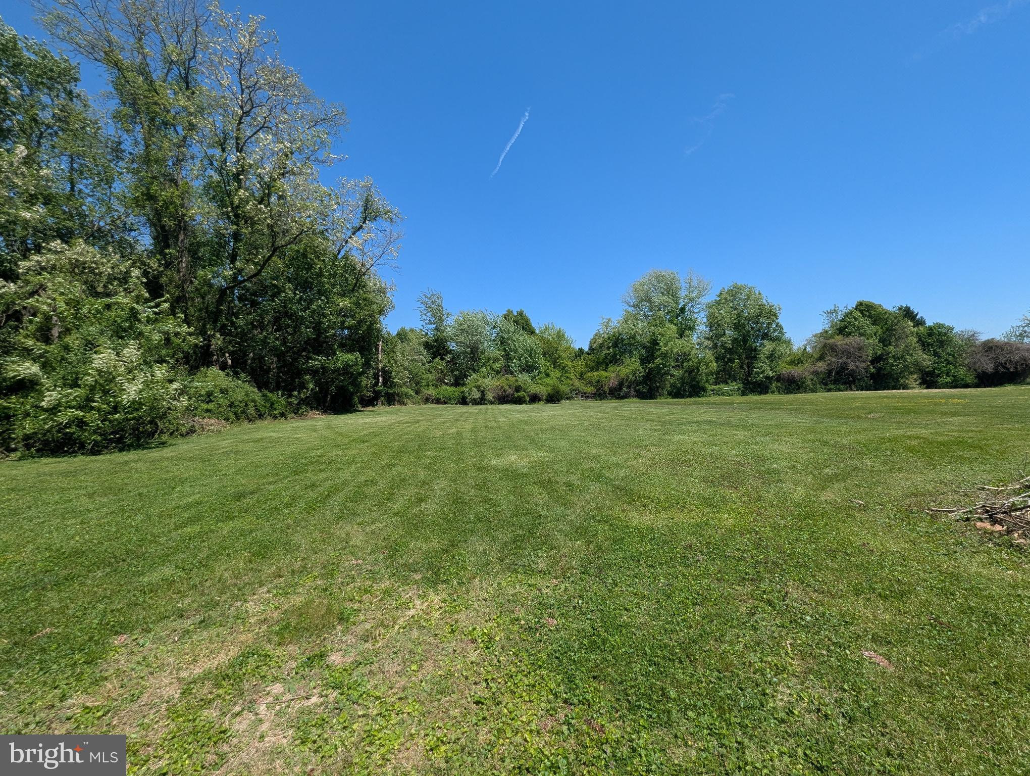 2215 Ady Road Forest Hill, MD 21050 - Photo 11 of 23 a view of a grassy field with trees