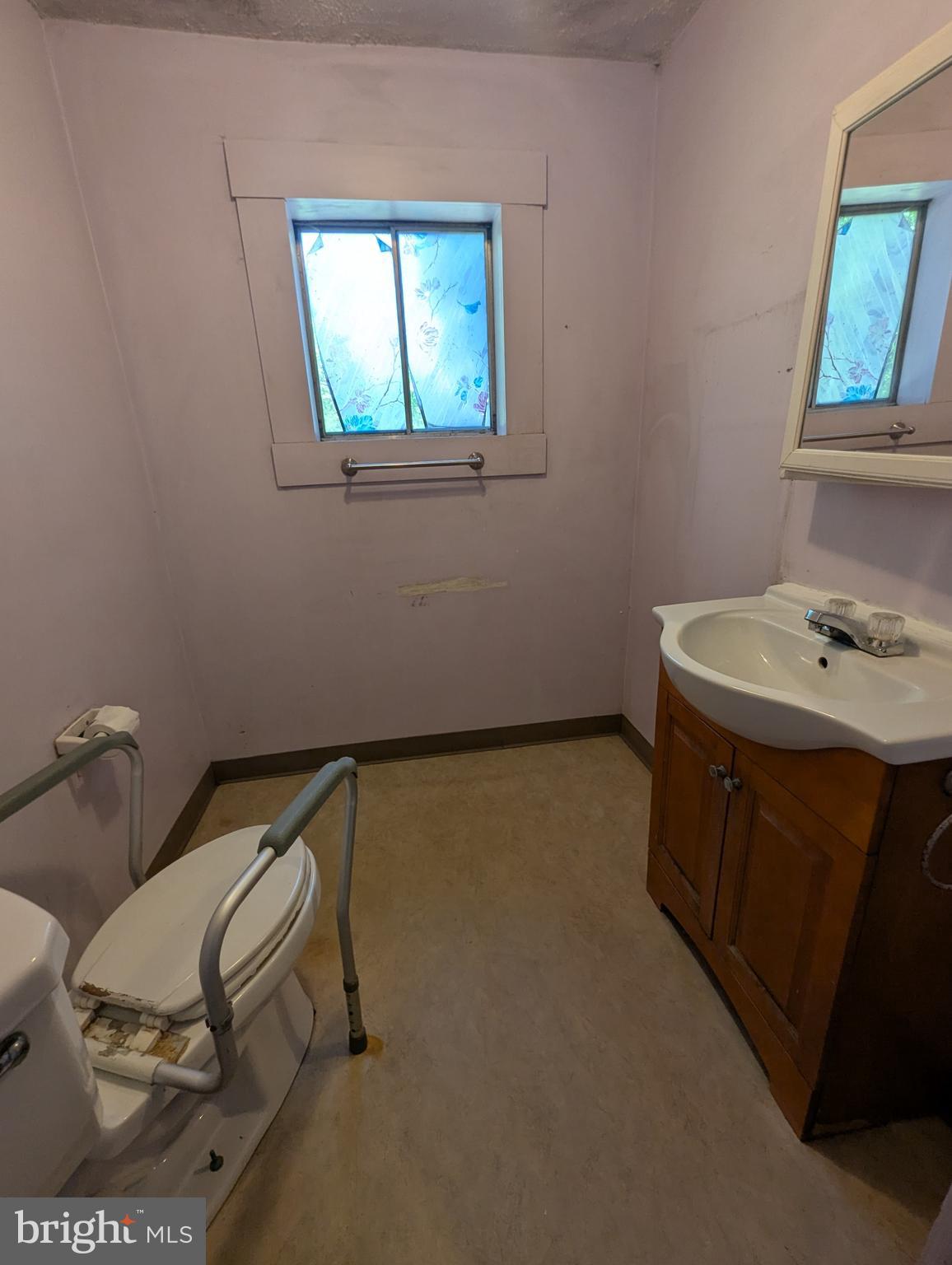 2215 Ady Road Forest Hill, MD 21050 - Photo 15 of 23 a bathroom with a sink toilet and mirror