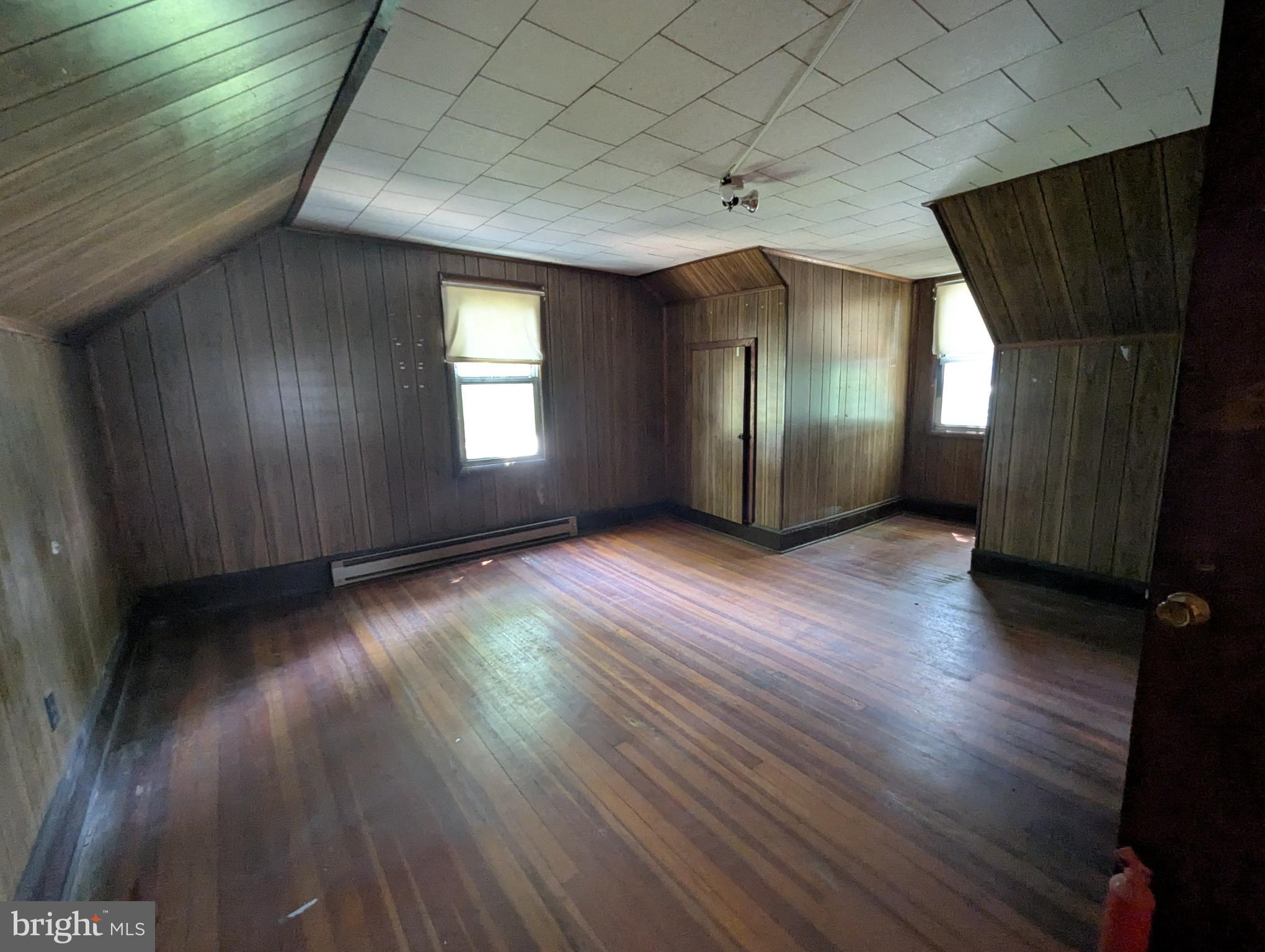 2215 Ady Road Forest Hill, MD 21050 - Photo 23 of 23 an empty room with wooden floor and windows