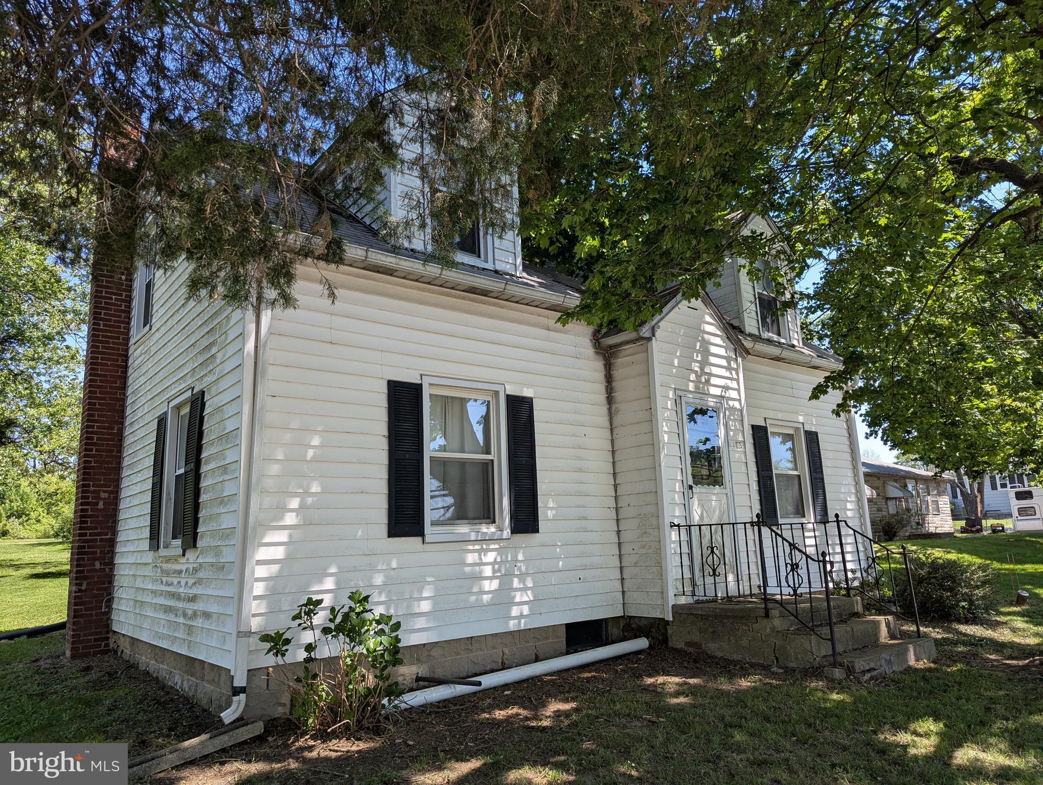 2215 Ady Road Forest Hill, MD 21050 - Photo 9 of 23 a front view of a house with a garden