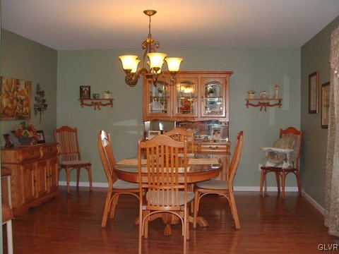 4145 Walter Road Bethlehem, PA 18020 - Photo 4 of 11 a view of a dining room with furniture wooden floor and chandelier