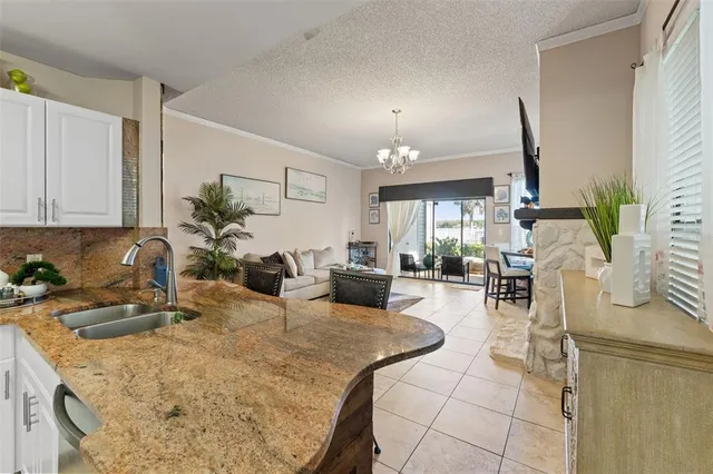 a view of a living room and dining room