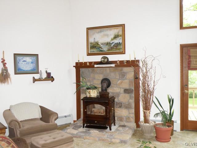 145 Hawk Road Lehighton, PA 18235 - Photo 12 of 50 a living room with furniture and a fireplace