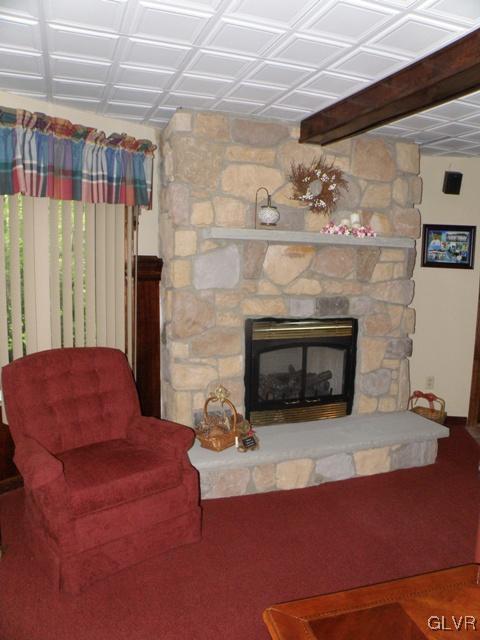 145 Hawk Road Lehighton, PA 18235 - Photo 17 of 50 a living room with furniture and a fireplace