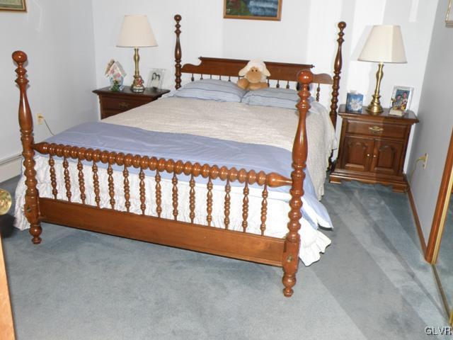145 Hawk Road Lehighton, PA 18235 - Photo 27 of 50 a bedroom with a bed and wooden floor