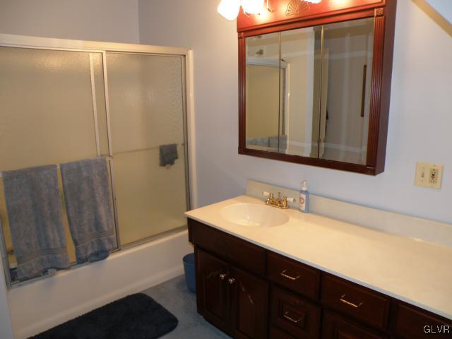 145 Hawk Road Lehighton, PA 18235 - Photo 34 of 50 a bathroom with a sink and a mirror